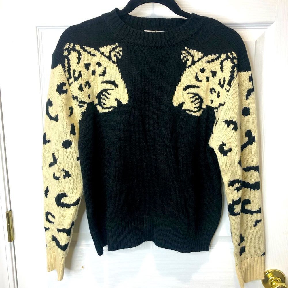Angashion black and cream twin cheetahs king sleeve sweaters, size small